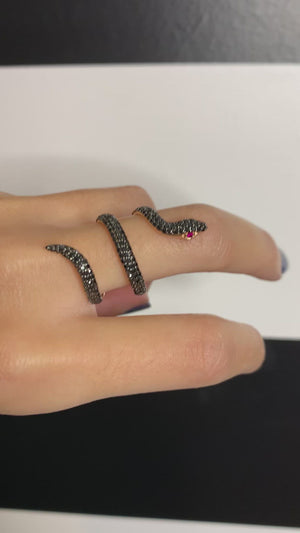 
                  
                    Load and play video in Gallery viewer, lilor jewels black diamond snake elysium ring with ruby eyes
                  
                